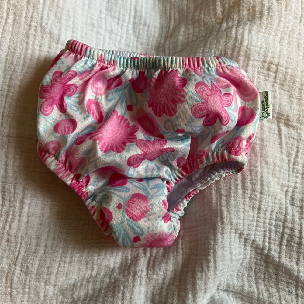 Swim diapers for baby girl six months size washed, never worn